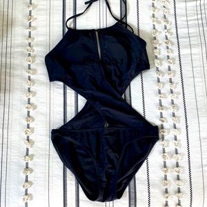 This cute monokini is a fun and sexy suit that’s been gently worn.